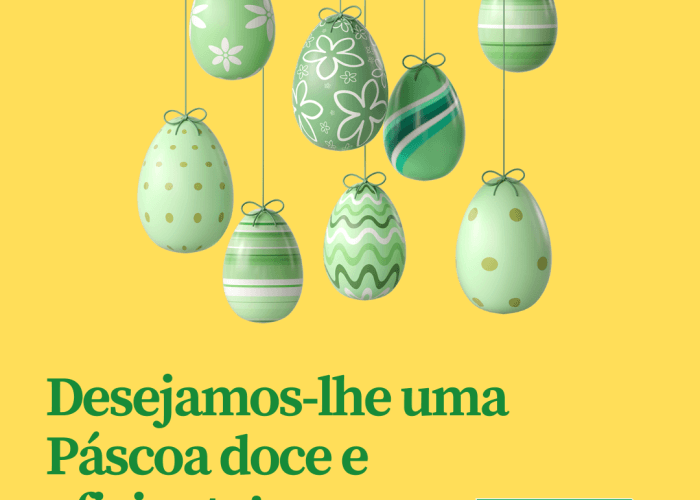 Ovos de Páscoa suspensos com decorações a verde e o texto Desejamos-lhe uma Páscoa doce e eficiente!